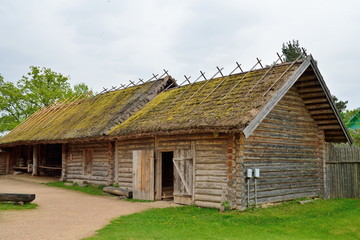 Fototapeta na wymiar Old Russian log hut in Pushkin Mikhailovskoe