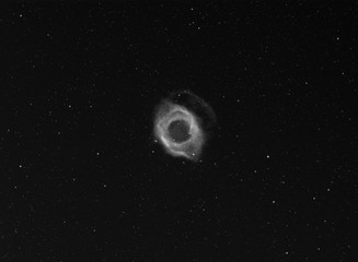 The Helix Nebula, also known as The Helix, NGC 7293, is a large planetary nebula located in the constellation Aquarius.