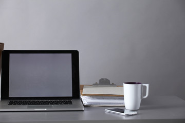 Workspace with computer and document in office