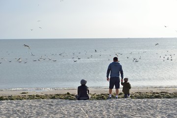 Small family at the sea
