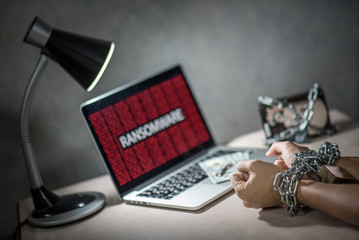 Hard disk file locked with monitor show ransomware cyber attack internet security breaches on...
