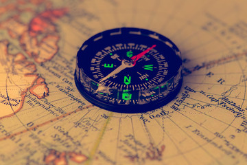 Fototapeta na wymiar compass on the world map
