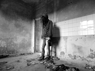 Young alcohollic women with alcohol bottle, alcohol addiction