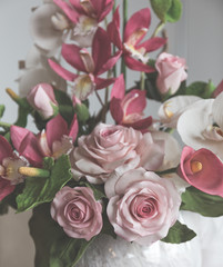 Decoration on the cake: decorative roses and flowers made of mastic or sugar