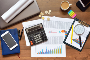 Financial printed paper charts, graphs and diagrams