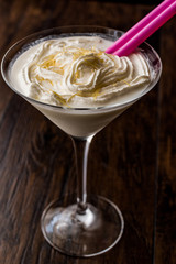Caketini Cocktail with whipped cream / Vanilla Smoothie with pink straw.