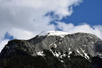 Fototapeta na wymiar Snow-capped mountain on European Alps.