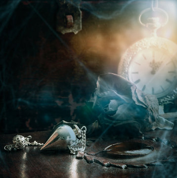 Dark magic scene with hypnosis-tools -backround with copy space