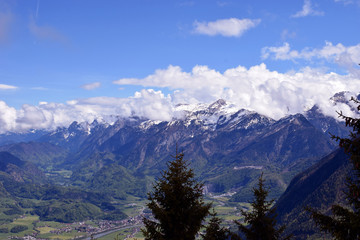 Snow-capped mountains and valley. Beautiful alpine landscape from Rossfeldstrasse panorama road on German Alps near Berchtesgaden, Bavaria, Germany to Austria side of the border.