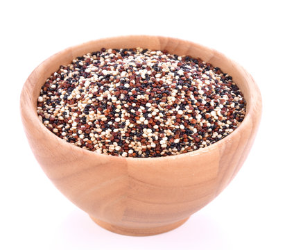 Quinoa Seeds In Wood Bowl On White Background