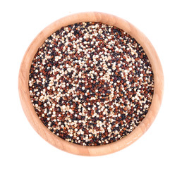 Quinoa seeds in wood bowl.Top view.