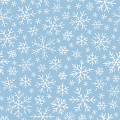Christmas seamless doodle pattern with snowflakes