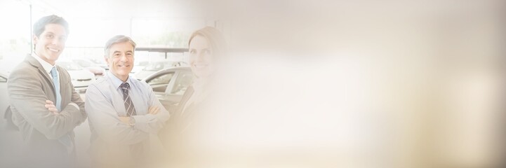 Portrait of smiling business team standing together