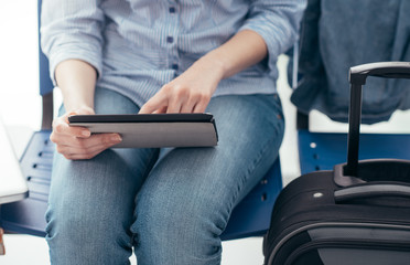 Woman connecting in the waiting room