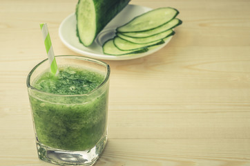 the vegetarian food with a cucumber and smoothie/green smoothie from a cucumber for vegetarians