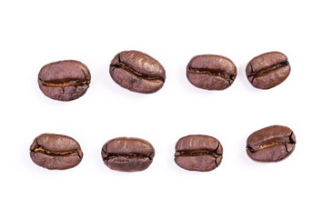 Roasted coffee beans on white background