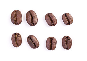 Roasted coffee beans on white background
