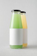 Juice Bottle Mock-Up - Two Bottles. Blank Label
