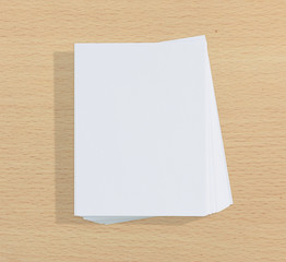 White Paper On Wood Table Of Background