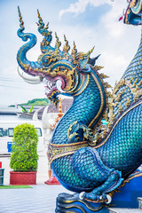 blue naga statue in buddhism temple thailand