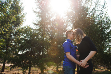 Fototapeta premium Portrait of young couple in love in a park