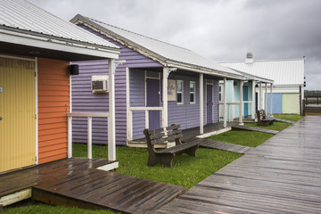 Colorful painted cottages at Spinnakers Landing, Summerside, PEI, Canada