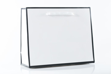 White paper shopping bag isolated.