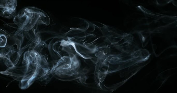 Smoke of Cigarette rising against Black Background, Slow Motion 4K