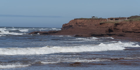 Fototapeta na wymiar Cliffs overlooking the water, Cavendish Beach, Prince Edward Island, Canada