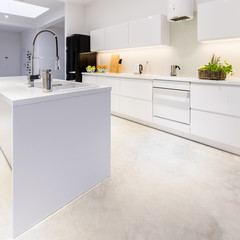 Fototapeta na wymiar Spacious kitchen with modern furnitures