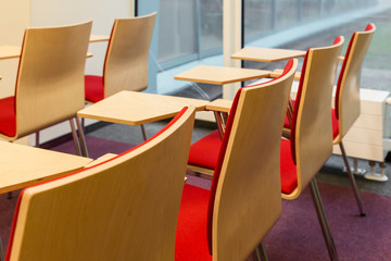 Classroom with simple desks and chairs