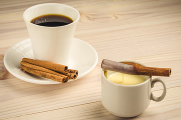 cup of coffee with cinnamon and condensed milk/cup of coffee with cinnamon and condensed milk