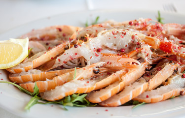 restaurant dish with raw shrimp