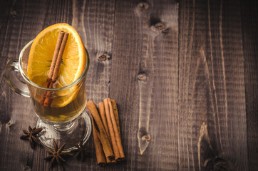 hot tea with spices/hot tea with spices on wooden background