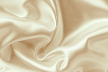 Obraz premium golden fabric with large folds, abstract background