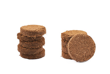 Compressed compost tablet isolated