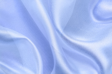 blue transparent fabric with large folds,  abstract background