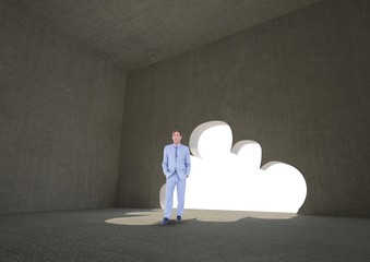 Businessman standing by cloud shape doorway