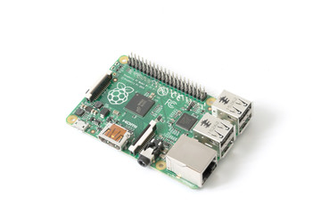 a Raspberry Pi 2 Model B board, isolated on white background. Is a series of single-board computers developed by the Raspberry Pi Foundation. - obrazy, fototapety, plakaty