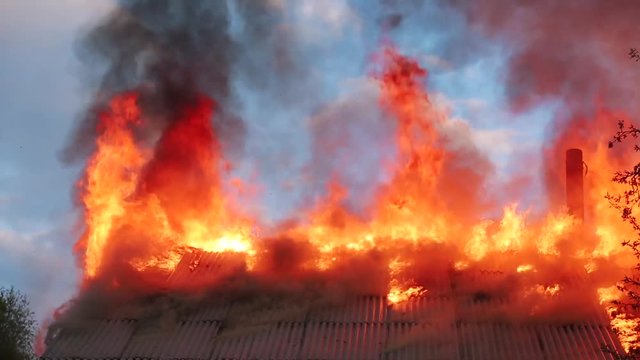 burning roof of the house during a fire