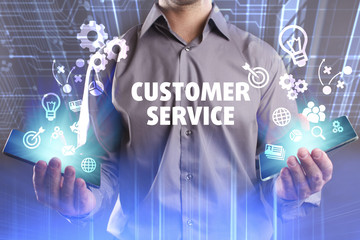 Business, Technology, Internet and network concept. Young businessman working on a virtual screen of the future and sees the inscription: Customer service