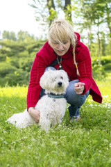 Woman with a dog in the park
