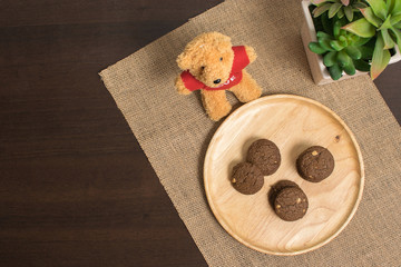chocolate chip cookies on wood background
