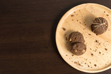 chocolate chip cookies on wood background