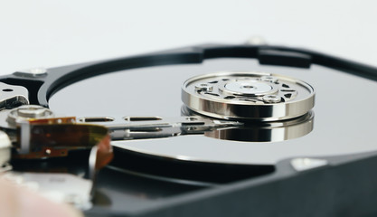 Open cover harddisk and harddisk back - harddisk drive is the data storage for the digital data where is in the your computer isolate on white