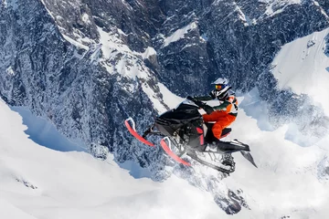 Foto auf Leinwand mit dem Schneemobil springen © Silvano Rebai