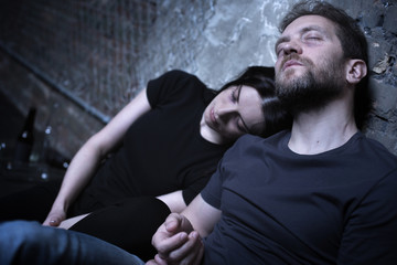 Prostrate heroin users sleeping on the street