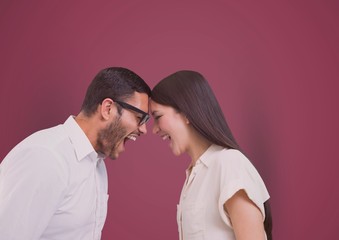 Business colleagues with head to head screaming 