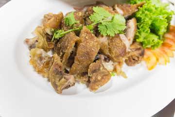 Steam pork leg with vegetable food background 