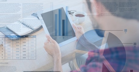 Businessman using digital tablet with overlay